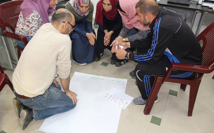 A group of teachers perform an exercise to assess trauma.