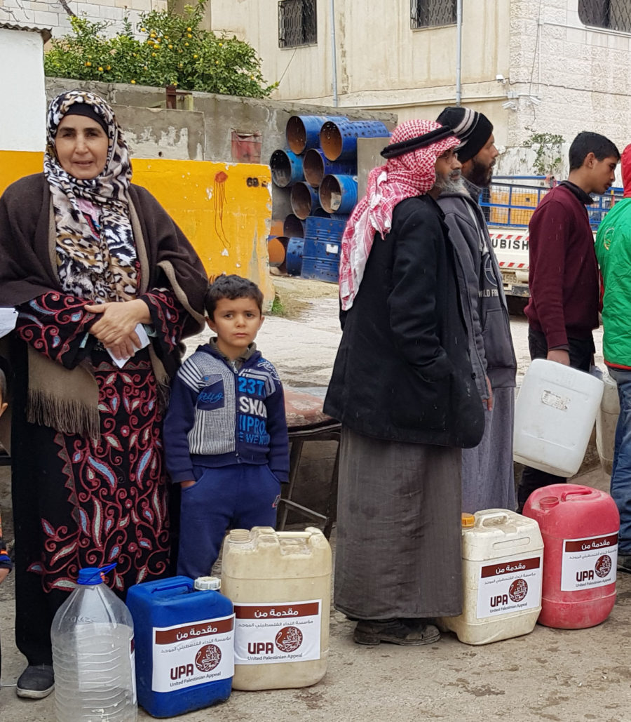 Families in Gaza Camp waiting for fuel.