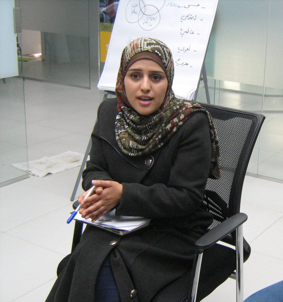 Islam speaking to a group of parents in Gaza.