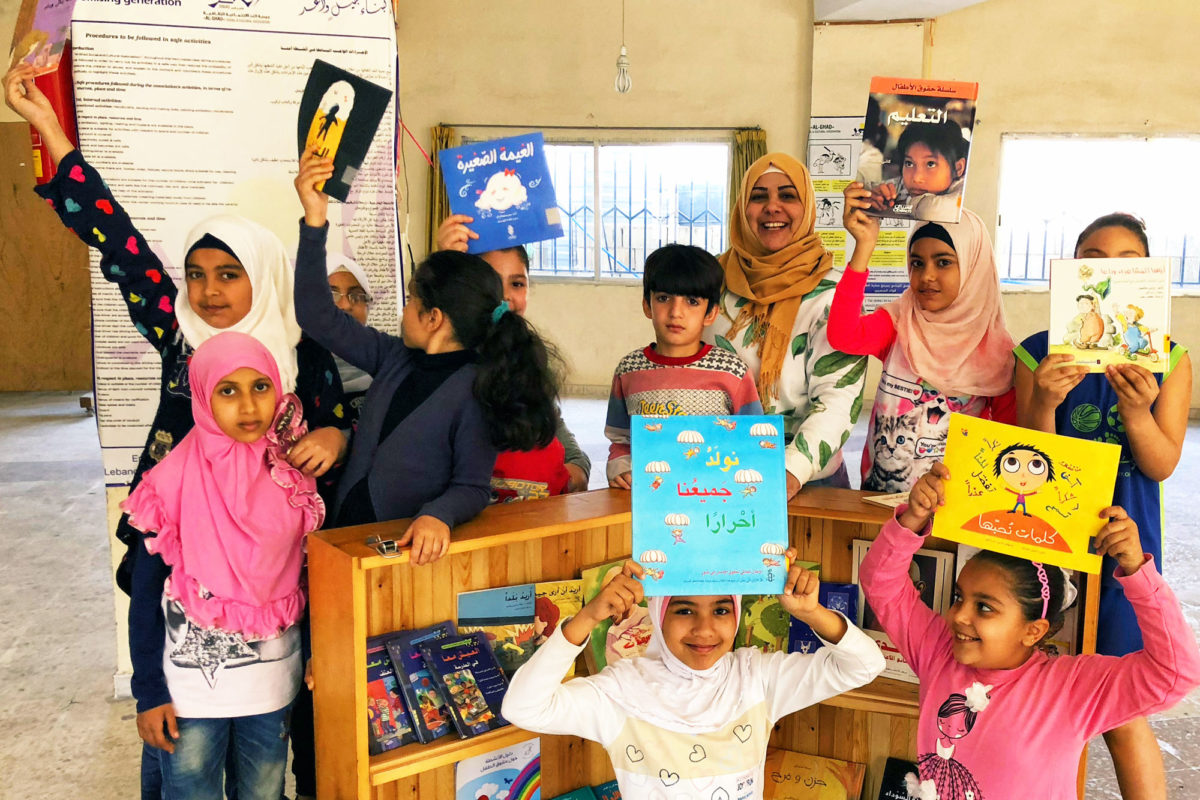 Children participate in reading program.