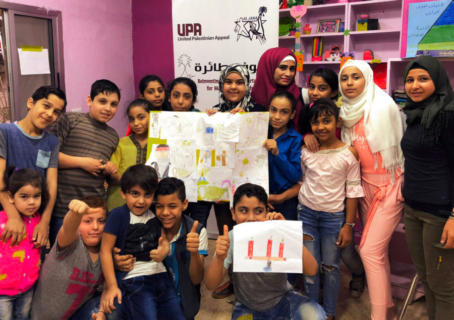 Children reading in Lebanon.