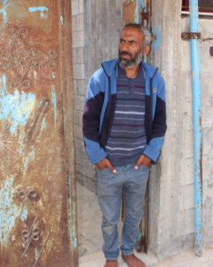 Ashraf outside his home in Gaza.