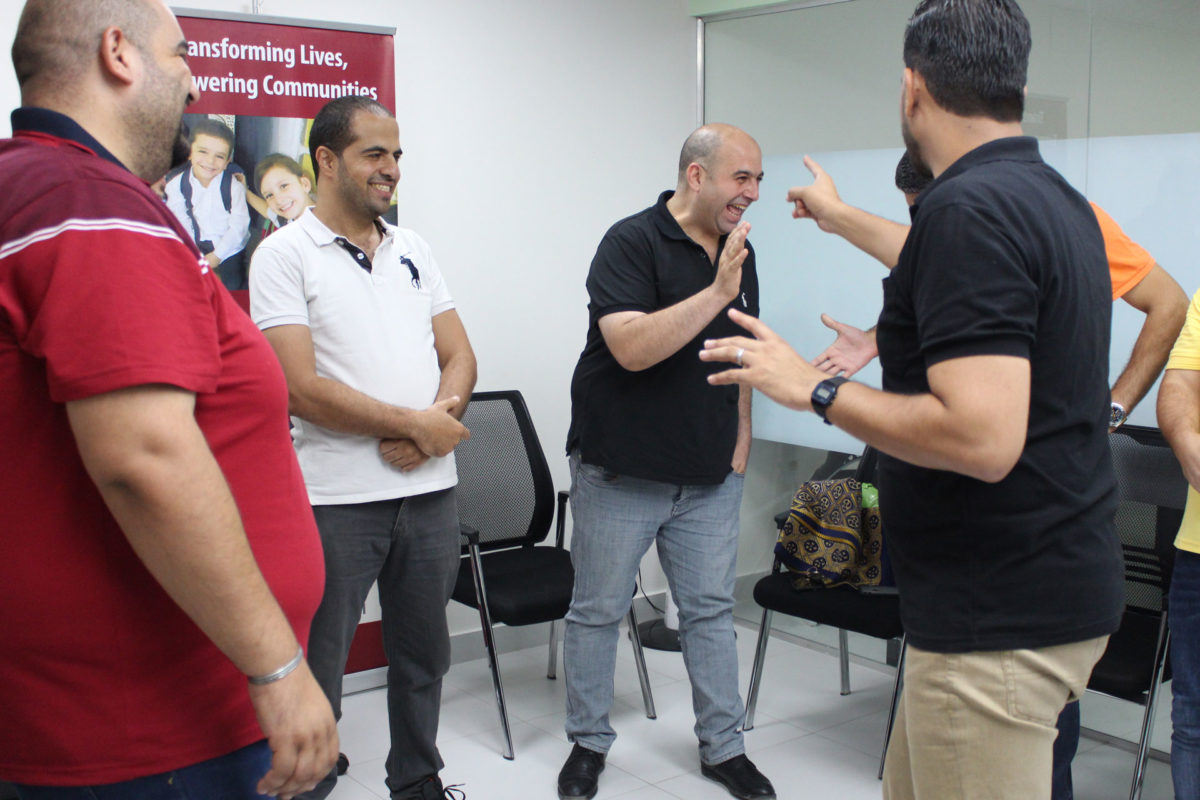 Fathers participate in a psychoeducation session in Gaza.