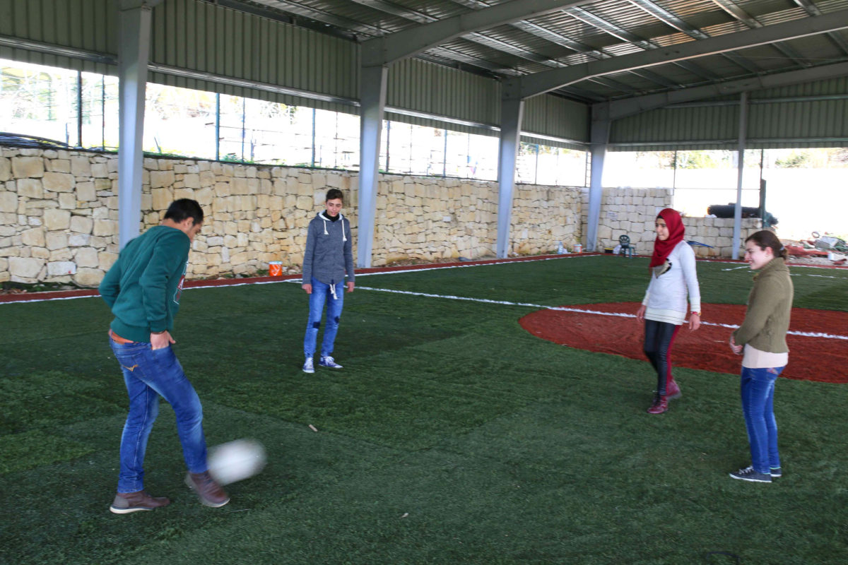 Palestinian Children playing soccer in Lebanon.