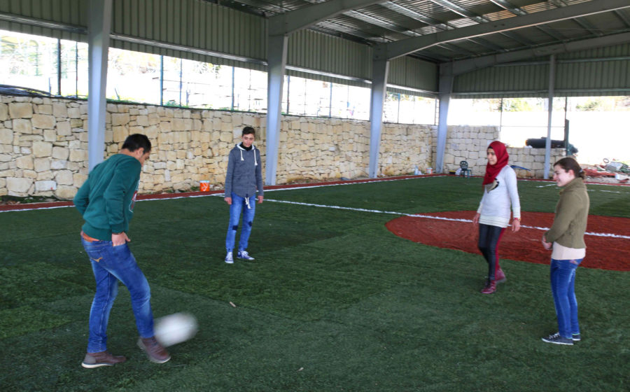 Palestinian Children playing soccer in Lebanon.