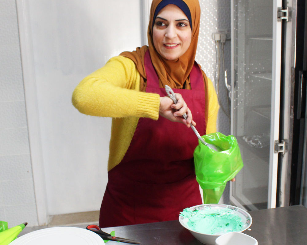 Ayat prepares a cake in Gaza.