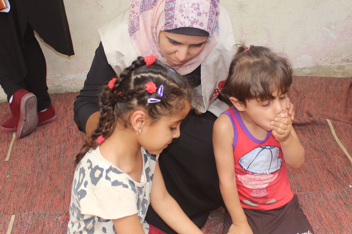 Eman visits children in Gaza.